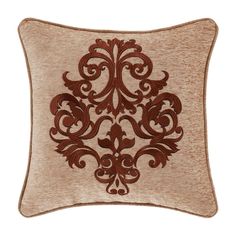 a decorative pillow with an embroidered design on it