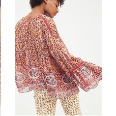 A Mix Of Boho Prints Combine For An Eclectic Look With This Breezy Free People Top, A Layer-Ready Style That Can Be Worn Closed Via Ties At The Front. V-Neck; Ties At Front Chest Trim At Back And Sleeves Polyester Machine Washable Floral Print Peasant Top For Fall, Floral Print Relaxed Fit Peasant Top For Fall, Relaxed Fit Floral Print Peasant Top For Fall, Fall Floral Print Peasant Top With Relaxed Fit, Bohemian Floral Print Tops For Fall, Bohemian Blouse With Floral Print And Relaxed Fit, Cotton Blouse With Boho Print For Fall, Fall Bohemian Paisley Print Blouse, Patterned Printed Peasant Top For Fall