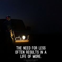 a man standing in front of a car at night with the words, the need for less often results in a life of more