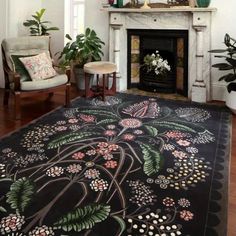 a living room filled with furniture and a fire place