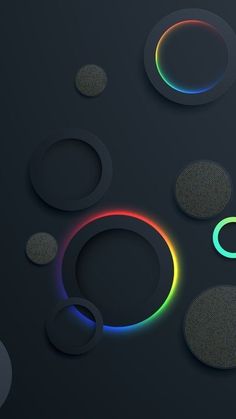 an abstract background with circles, dots and lines on black paper that has been colored in different colors