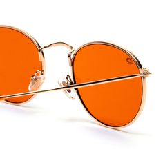 Gender: Unisex Frame: Gold Metal Wireframe UV Rating: UV400 Fit / Size: Small In the Box: Sunglasses & Microfiber Pouch Lens Width: 50mm Lens Height: 45mm Bridge Width: 15mm Arm Length: 125mm Orange Sunglasses For Outdoor Summer Use, Orange Sunglasses For Summer Outdoor Activities, Orange Sunglasses For Summer Outdoor, Trendy Orange Sunglasses With Polarized Lenses, Trendy Orange Polarized Sunglasses, Trendy Orange Shield Sunglasses With Mirrored Lenses, Summer Orange Aviator Sunglasses With Tinted Lenses, Summer Orange Tinted Aviator Sunglasses, Modern Orange Aviator Sunglasses With Tinted Lenses