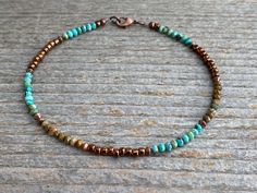 This dainty anklet is designed with several earthy natural turquoise stones, copper colored Czech glass beads and copper components. Hubei Turquoise is well known for its wide variety of colors, these are natural stones with no color enhancements.  All of my anklets are strung on 49 strands of Accu-Flex wire to ensure that each piece will be long-lasting and durable. TURQUOISE - This gemstone is known as the master healer and stone of protection, it will help remove negativity and encourage you to live in the moment. Details: Anklet is made with copper components Features: 2-3mm natural faceted Turquoise gemstones Copper colored Czech glass beads lobster clasp: Copper Length of anklet is 9 inches  Ankle sizes vary depending on how loose you want to wear it. PLEASE MEASURE YOUR ANKLE PRIOR Remove Negativity, Dainty Anklet, Hubei Turquoise, Turquoise Anklet, Beaded Ankle Bracelets, Beautiful Anklet, Beaded Ankle, Beaded Anklet, Ankle Jewelry