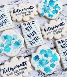 decorated cookies with the words retirement and reminders for guests to write in blue ink