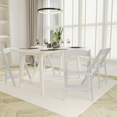 a white table and chairs in a room