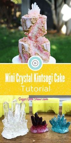 three small cakes sitting on top of a wooden table next to a sign that says mini crystal kningsy cake