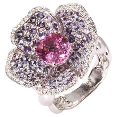 Anémone ring by Mathon Paris at Second Petale Gallery Explore an enchanted universe and witness the vivid colors gemstones with the Anémone ring in purple and pink sapphires, diamonds and white gold. About the Gemstones : Diamonds (0,25 ct) Purple Sapphires (2,69 ct) Pink Sapphires (2,68 ct) ABOUT the CREATOR MATHON PARIS : FRENCH STYLE SINCE 1931 "JOAILLERIE DE FRANCE" label "Living Heritage Company" French State excellence "RESPONSIBLE JEWELLERY COUNCIL" certificate Maison Mathon Paris is the story of a 4-generation family that makes jewelry for the great houses of Place Vendôme, as well as own label creations. Mathon's identity is based on colors and an exceptional savoir-faire in which they have become specialists: lacquering, sculpting, hand engraving, gold texturing, chasing. All sta International Jewelry, Purple Sapphire, White Gold Ring, Sapphire Diamond, French Style, Hand Engraving, Pink Sapphire, Cocktail Rings, White Gold Rings