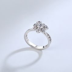 There's nothing as eye-catching as the sparkle of a glistening ring gracefully resting on a woman's hand.Now,you can wear a ring with a beautiful flower design. This simple and engraved ring is sure to be one of your favorites!Weight: 2.97 gHeight: 11 mmMaterial: Plating Color: Silver Beautiful Flower Designs, A Beautiful Flower, Engraved Ring, Personalized Rings, Engraved Rings, Beautiful Flower, Quality Jewelry, Flower Design, Sterling Silver Ring