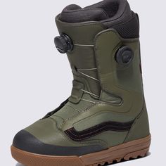 the snowboard boots are green and brown