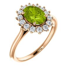 14KT Gold 1.35 CT Oval Peridot and 0.42 CTW Round Brilliant Diamond Oval Halo Ring. Oval Halo Ring, Blue Stones Jewelry, Peridot Jewelry, Natural Diamond Ring, Peridot Ring, Rings Cool, Halo Diamond Ring, Halo Ring, Halo Rings