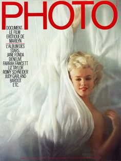 a magazine cover with a woman covered in white sheets on top of her head and the words photo