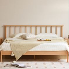 the bed is made and ready for someone to use it in their home or office