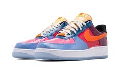 The Undefeated x Nike Air Force 1 Low “Multicolor Patent” is a head-turning collaboration by the California based retailer and Nike on the classic sneaker.  The “Multicolor Patent” features a glossy leather construction with a mismatched color block of blue, fuchsia, crimson, purple, and black panels that draws attention everywhere it goes.  An orange patent leather Swoosh appears on either side of the shoe.  An “UNDFTD” lace dubrae is found on the vamp and the brand’s “Five Strikes” logo appear Air Logo, New York Fits, Patent Shoes, Nike Air Force 1 Low, Air Force 1 Low, Classic Sneakers, Type Of Pants, High Fashion Street Style, Nike Air Force 1