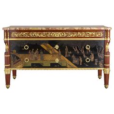 an ornately decorated chest with figures on it