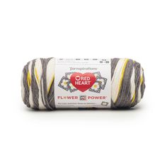 yarn ball with yellow and grey stripes on the top, in front of a white background