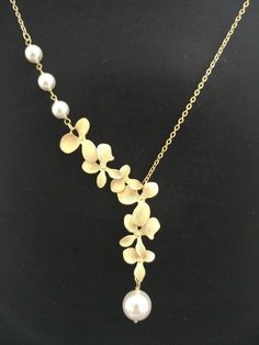 Cascade Triple white pearl Orchid flower Gold Silver Rose | Etsy Elegant Flower Necklace With Clavicle Chain For Party, Delicate Lariat Necklace For Party, Elegant Adjustable Flower Necklace For Wedding, Elegant Flower-shaped Pearl Chain Necklace, Elegant Pearl Flower Necklace With Pearl Chain, Elegant Flower Necklace With Pearl Chain, Elegant Pearl Chain Flower Necklace, Elegant White Flower Necklace With Delicate Chain, Gold Flower Necklace With Pearl Chain