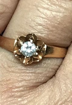 Vintage 14K Yellow Gold 1/4 CT ROUND DIAMOND Flower Engagement Ring Beautiful! Gorgeous ring! * Crafted in solid 14K yellow gold, the ROUND cut center diamond is approximately .25ct. G/H color. * Very pretty ring! * 2.3 grams * Size 6.75 with sizer (there is a sizer in ring band)  * Will ship Insured 14k Gold Flower-shaped Diamond Ring For Anniversary, Gold Diamond Flower Ring For Anniversary, 14k Rose Gold Flower Ring For Anniversary, Rose Gold Flower Ring Stamped 14k For Anniversary, Formal 14k Gold Flower Diamond Ring, Classic 14k Stamped Flower Ring For Anniversary, Black Opal Pendant, Flower Engagement, Locket Ring