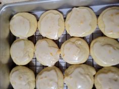 glazed donuts sitting on a cooling rack ready to be baked