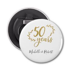 a white button with the words 50 years written on it