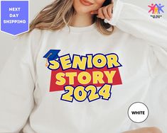 Senior Story 2024, College University Graduation Sweatshirt, Senior 2024 Sweatshirt, High School Sweatshirt, 2024 Senior Sweater, College Graduation Sweater ORDERING: 1. Review all photos 2. Choose Size and Color from drop-down menu 3. If personalization box is available, add your text color 4. Add each shirt to cart one at a time 5. Click "Add to Cart" - you can go back to add more products 6. Click "Proceed to Checkout" 7. Add note to seller for any requests * We use several different brand sh High School Sweatshirts, Senior Sweater, Graduation Hoodies, Senior Hoodies Design Ideas, Senior Hoodies, Hoodies Design Ideas, Senior Sweatshirts, School Designs, University Graduation