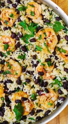 rice with shrimp and black beans in a pan