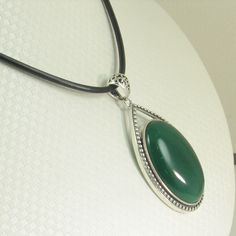 Oval Jade Cabochon Necklaces, Oval Jade Cabochon Necklace, Elegant Green Cabochons As Gifts, Elegant Green Cabochons For Gifts, Handmade Classic Oval Cabochon Jewelry, Classic Handmade Oval Cabochon Jewelry, Jade Cabochon Oval Pendant Necklace, Silver Jade Oval Pendant Jewelry, Oval Jade Jewelry With Large Stone