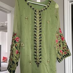 Kurta With Pants In Green With All Handwork On Sleeves Festive Wear Never Wore Its New Size Medium . Green Festive Summer Pants, Festive Green Summer Pants, Summer Festive Green Pants, Traditional Fitted Green Pants, Fitted Green Traditional Pants, Fitted Green Festive Bottoms, Fitted Green Bottoms For Festive Occasions, Festive Fitted Green Bottoms, Festive Fitted Casual Pants