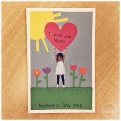 a mother's day card with a girl holding a heart shaped paper cutout