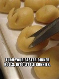 a knife cutting up some food on top of a white counter with the caption, turn your easter dinner rolls into little bunnies