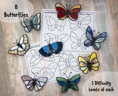 butterflies cut out and placed on top of each other to make a butterfly craft for kids