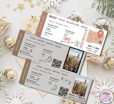 two tickets sitting on top of each other next to christmas decorations and gold ornaments with the city skyline in the background