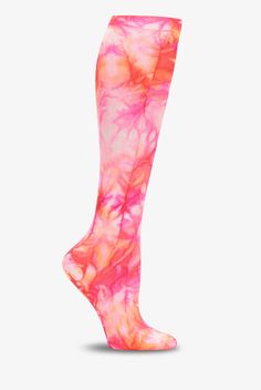 Treat your feet and legs to a little support. The light, gradient compression of Nurse Mates NA0033599-Tie Dye-Fuchsia Flame Women s Compression Socks is designed to help energize and soothe. Compression is greatest at the ankle, lessens gradually to the non-binding top band. Colorful, long-lasting print. One size fits most. • Nylon-stretch blend • Light compression: 12-14 mmHg • Gradient compression • Controlled pressure from the ankle up • Promotes better blood circulation • Reduces leg fatigu Multicolor Stretchable Breathable Socks, Breathable Stretch Multicolor Socks, Comfortable Pink Knee-high Socks, Comfortable Knee-high Pink Socks, Multicolor Stretch Sports Socks, Pink Stretch Knee-high Socks, Comfortable Stretch Pink Knee-high Socks, Spring Sports Socks With Stretch, Stretch Sports Socks For Spring