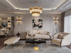 a living room filled with furniture and a chandelier