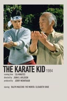 the karate kid poster with an older man and younger man in front of trees, holding their hands together