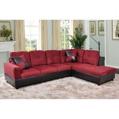 a living room with a red sectional couch