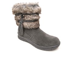 Shake up your style with the perfect boot for snowy treks: Minnetonka's Everett! Featuring layers of cascading faux fur accented by a braided suede tie, you'll demand attention at every turn. This water repellent winter boot is ideal through the wintery months for a playful edge that goes with any outfit. Durable faux fur and suede upper, Easy pull-on entry, Flat heel, Classic round toe, Cushioned insole for added comfort, Durable and lightweight EVA traction outsole, Decorative suede tie for ad Designer Winter Boots, Boots For Ladies, Boot Cuffs, Snow Boots Women, Winter Boots Women, Faux Fur Collar, Mid Calf Boots, Fur Collars, Charcoal Gray