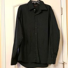 Mens Button Down Shirt That Is A Size Xxl. It Is Like Brand New. Black With A Gray Pin Stripe. Casual Black Long Sleeve Dress Shirt, Black Business Shirt With Buttons, Black Button-down Shirt For Business, Black Buttoned Shirt For Business, Black Business Shirt With Button Closure, Black Button-up Business Shirt, Black Button-up Shirt For Business Casual, Black Shirt With Buttons For Business Casual, Black Collared Dress Shirt With Button Closure