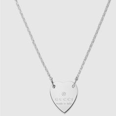 Authentic Gucci Trademark Necklace With Heart Pendant Style 223512 J8400 8106 A Timeless Design, This Necklace Features A Heart Pendant Engraved With The Gucci Trademark. Crafted From 925 Sterling Silver, The Jewelry Piece Reflects The House's Romantic Narrative. - 925 Sterling Silver - 18.9” Length Adjustable To 17.7” - Pendant Is .7” X .6” - Made In Italy - This Was Produced Using Hypoallergenic Materials In Accordance With The Current International Regulations Excellent Condition, Only Worn O Necklace With Heart, Gucci Jewelry, A Heart, Heart Pendant, Womens Jewelry Necklace, Jewelry Pieces, Timeless Design, In Italy, Jewelry Necklaces