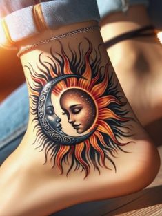 a woman's foot with a sun and moon tattoo on it