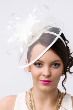 You are a picture of glamorous sophistication when you put on this romantic fascinator! Modern with a vintage touch, this elegant horse hair mesh base adorns a beautiful bouquet of soft feathers. A soft satin trim offers and allure that's simply breathtaking. - Horse hair mesh - Easy wear slip-on headband - Available in 4 colors Ribbon Veil, Feather Bouquet, Elegant Horse, Hexagon Sunglasses, Blonde Bob Wig, Happy Hat, Fascinator Headband, Ankle Chain, Leaf Bracelet