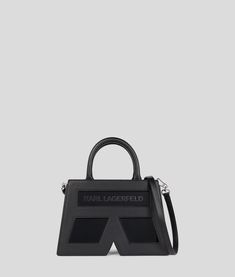 Discover the wide array of IKON K TOP-HANDLE BAG for women by KARL LAGERFELD. Stand out no matter what the setting, with these iconic, rock-chic pieces. | Pay with Credit Cards, Paypal, ApplePay and AmazonPay Modern Satchel With Detachable Handle, Heel Accessories, Blouse Jeans, Backpack Travel Bag, Rock Chic, Shopper Tote, Evening Clutch Bag, No Matter What, Handle Bag