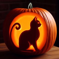 a carved pumpkin with a cat on it