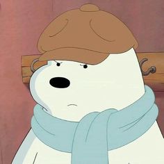 a polar bear wearing a hat and scarf