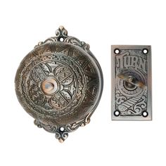 an ornate door handle and cover with the word lubin on it's side