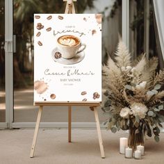 an easel with a cup of coffee on it