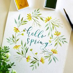 a watercolor painting with the words hello spring on it