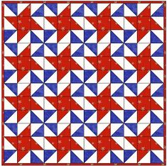 a red, white and blue quilt with stars in the center on it's side