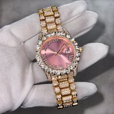 Step into elegance with this iced-out diamond timepiece that mirrors genuine luxury watches. We utilize premium simulated diamonds crafted from high-refractive crystals, ensuring a sparkle that rivals authentic diamonds under the light! INCLUDES AN EASY-TO-USE SIZE ADJUSTMENT TOOL Specifications: - Gender: Women's - Case Size: 42mm - Movement: Quartz Movement - Battery: Included - Sizing: 8.5-inch band - Adjustable: Links are removable to fit your wrist - Back: Stainless Steel - Lock: Deployment Clasp - Stone: VVS Diamond Simulate - Case Material: Alloy - Finish: Gold Plating  Whether you're dressing up for casual days, or events, or gifting someone special on occasions like Graduations, Valentine's Day, Anniversaries, Birthdays, Thanksgiving, Christmas, New Year, or Father's Day, this wat Vvs Diamond, Under The Lights, Beautiful Watches, Diamond Watch, Stylish Jewelry, Wrist Watches, Luxury Watch, Luxury Watches, Quartz Movement