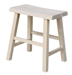 a wooden stool sitting on top of a white floor