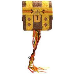 a yellow and brown handbag on a string with an orange cord hanging from it